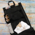 Canvas garment bag, 'Safe Travels' - Black Polyester Travel Bag with Multiple Compartments thumbail