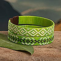 Natural fiber cuff bracelets, 'Green Colombian Geometry' (pair) - Green Cuff Bracelets Woven with Colombian Cane Fiber (Pair)