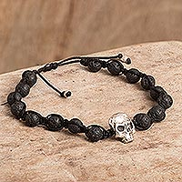 Silver and lava stone beaded bracelet, 'Fiery Underworld' - Silver Skull and Lava Stone Beaded Bracelet from Peru