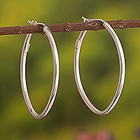 Sterling silver hoop earrings, 'Pampas Cat's Eye' - 925 Sterling Silver Ellipse Hoop Earrings from Peru