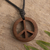Wood pendant necklace, 'Peruvian Peace' - Wood Peace Sign Pendant with Black Cotton Cord