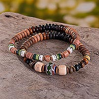 Ceramic beaded stretch bracelets, 'Forest Stroll' (pair) - Ceramic Beaded Bracelets in Earthtone Colors (Pair)