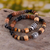 Ceramic beaded stretch bracelets, 'Inca Path' (pair) - Ceramic Beaded Bracelets in Earth Tone Black & White (Pair) thumbail