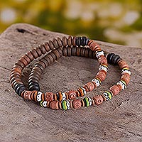 Ceramic beaded stretch bracelets, 'Cusco Stroll' (pair) - Two Handmade Inca Inspired Ceramic Beaded Bracelets