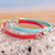 Sterling silver accented wristband bracelet, 'Dual Alignment' (Pair) - Red and Blue Wristband Bracelets with Sterling Silver (Pair)