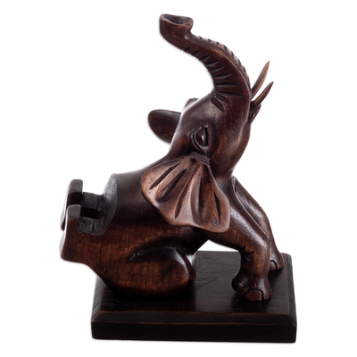 Wood phone holder, 'Prosperity Elephant' - Cedar Wood Hand-Carved Elephant Phone Holder from Peru