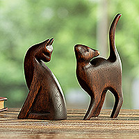 Wood sculptures, 'Fully Flirty' (pair) - Hand-Carved Cat Themed Wood Sculptures from Peru (Pair)