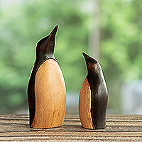 Wood figurines, ‘Penguin Mother and Child’ (pair) - Handcarved Cedar Wood Penguin Animal Themed Figurines (Pair)