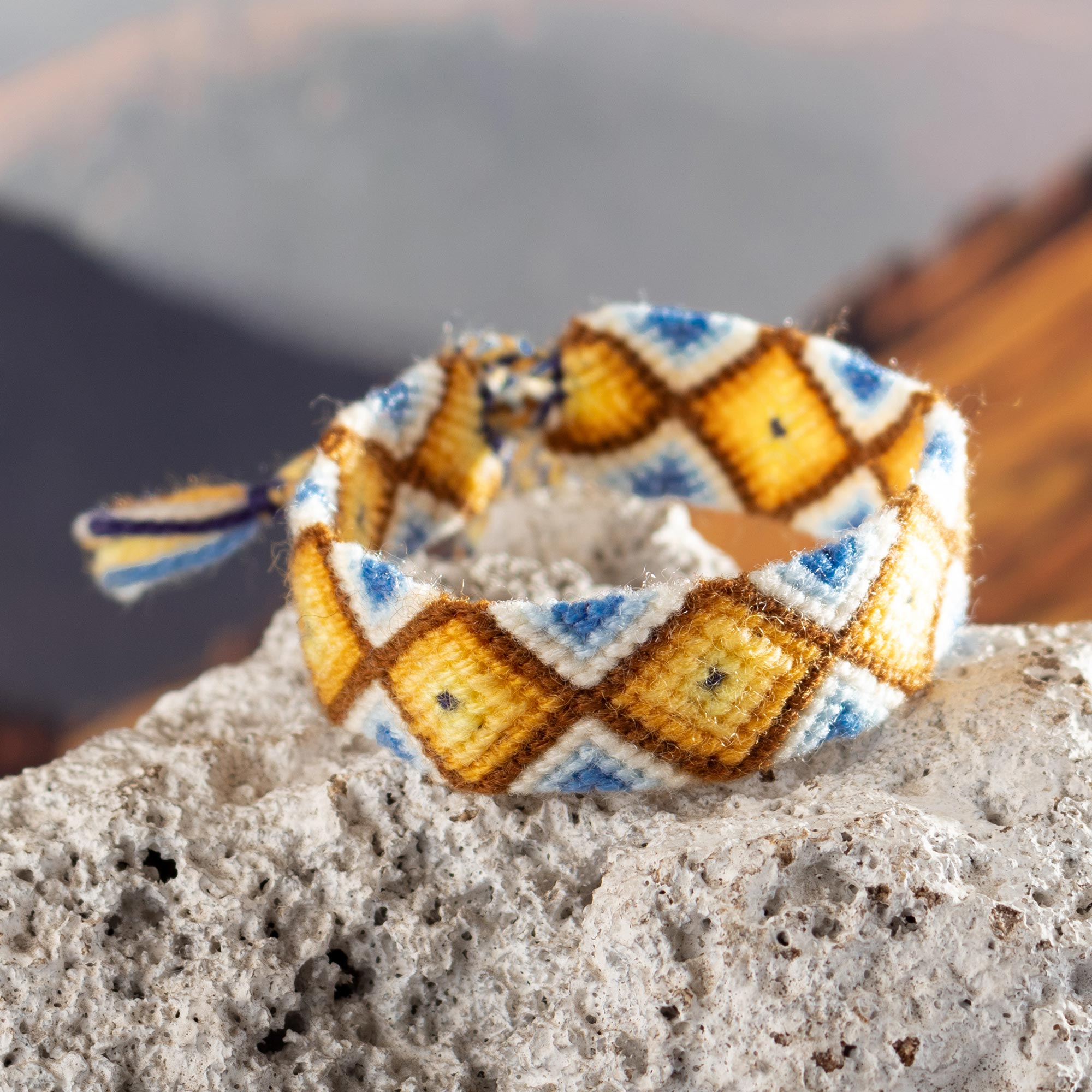Peruvian Hand-woven Unisex Macrame Wristband Bracelet, 'Walk in the Country  in Orange