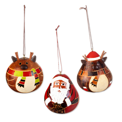 Dried gourd ornaments, 'Santa and His Reindeer' (set of 3) - Peruvian Hand-painted Set of 3 Dried Gourd Holiday Ornaments