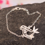 Sterling silver filigree pendant bracelet, 'World Peace in Flight' - Polished Sterling Silver Filigree Bracelet with Dove Pendant