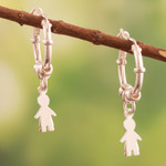 Sterling silver hoop earrings, 'Little Boy' - Polished Sterling Silver Hoop Earrings with Boy Motif
