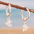 Sterling silver hoop earrings, 'Happy Dolphin' - Sterling Silver Hoop Earrings with Dangling Dolphin Charms (image 2) thumbail