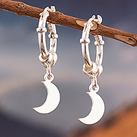 Sterling silver hoop earrings, 'Moon Center' - Sterling Silver Hoop Earrings with Dangle Moon Pendants