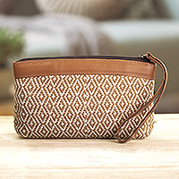 Handwoven cosmetic bag, 'Dunes' - Hand-Woven Cosmetic Bag with Faux Leather Accent & Strap
