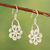 Sterling silver filigree dangle earrings, 'Rotating Flowers' - Modern Sterling Silver Filigree Dangle Earrings with Flowers