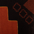 Wendeschal aus Alpaka-Mischung - Wendbarer Schal aus Alpaka-Mischung mit Chakana-Motiv in warmen Farben