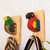 Wood coat rack, 'Eden Bird' - Hand-Painted Cedar Wood Coat Rack with Colorful Macaw thumbail