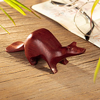 Wood mini figurine, 'Playful Otter' - Otter Mini Figurine Hand-Carved in Palo Sangre Wood