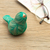 Wood and natural fiber figurine, 'Green Plumage' - Handmade Cedar Wood and Natural Fiber Bird Figurine in Green