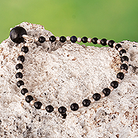 Onyx beaded bracelet, 'Protective Gleam' - Natural Black Onyx Beaded Bracelet Crafted in Peru