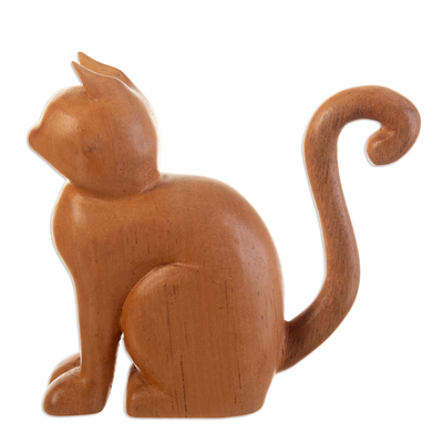 Wood sculpture, 'Claw' - Hand-Carved Brown Cedar Wood Cat Sculpture from Peru