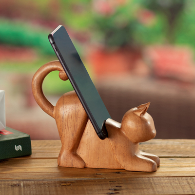 Wood phone holder, 'Convenient Purr' - Hand-Carved Cedar Wood Cat Phone Holder from Peru