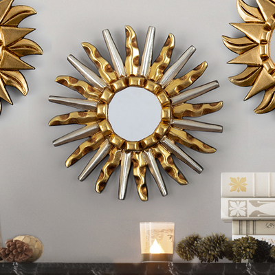 Wandspiegel aus vergoldeter Bronze und Aluminiumholz - Wandspiegel mit Sonnenmotiv aus vergoldeter Bronze und Aluminiumholz