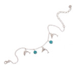 Sterling silver charm bracelet, 'Marine Protection' - Dolphin-Themed Reconstituted Turquoise Charm Bracelet
