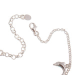 Sterling silver charm bracelet, 'Marine Protection' - Dolphin-Themed Reconstituted Turquoise Charm Bracelet