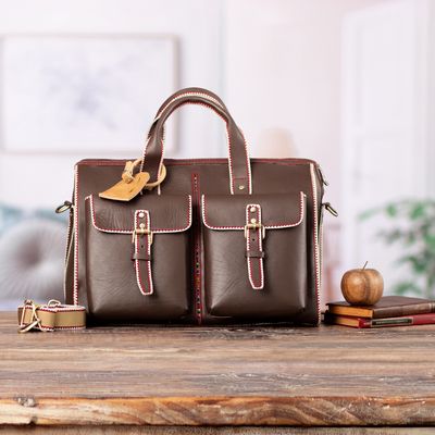 Leather travel bag, 'Explorer Journey' - Stitch-Trim Leather Travel Bag with Handwoven Wool Accent