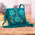 Hand-embroidered alpaca blend sling bag, 'Floral Traditions in Teal' - Teal Handwoven Sling Bag with Hand-Embroidered Floral Motifs