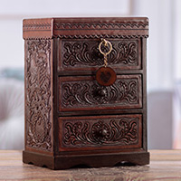 Wood and leather chest, 'Embossed Treasure' - Embossed Mohena Wood and Leather Chest with Key