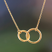 Gold-plated pendant necklace, 'Timeless Liaisons' - Fair Trade Modern Polished 18k Gold-Plated Pendant Necklace