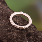 Sterling silver band ring, 'Intrepid Essence' - Avant-Garde Textured Sterling Silver Band Ring from Peru