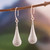 Sterling silver dangle earrings, 'Andean Dew' - Avant-Garde Drop-Shaped Sterling Silver Dangle Earrings