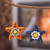 Ceramic ornaments, 'Ayacucho Flowered Stars' (pair) - 2 Orange Blue Star Floral-Themed Ceramic Christmas Ornaments (image 2) thumbail