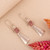 Rose quartz dangle earrings, 'Pyramids of Serenity' - Pyramid-Themed Silver Dangle Earrings with Rose Quartz Gems (image 2b) thumbail