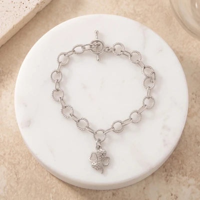 Sterling silver charm bracelet, 'Sylvan Fortune' - Good Luck Clover Charm Bracelet with Sterling Silver Band