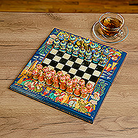 Wood chess set, 'Bukhara Strategies' - Handcrafted Painted Walnut Wood Chess Set in Blue