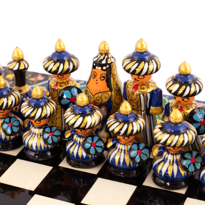 Wood chess set, 'Bukhara Gardens' - Handcrafted Floral and Leafy Black Walnut Wood Chess Set