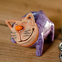 Ceramic figurine, 'Violet Meows' - Handcrafted Purple and Brown Ceramic Cat Figurine