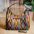 Ikat handbag, 'colours from the Road' - colourful Ikat Handbag with Five Exterior Zippered Pockets