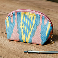 Ikat cotton cosmetic bag, 'Colorful Patterns' - Colorful Ikat Cotton Cosmetic Bag Crafted in Uzbekistan