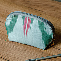 Ikat cotton cosmetic bag, 'Trendy Patterns' - Cotton Cosmetic Bag with Ikat Patterns Crafted in Uzbekistan