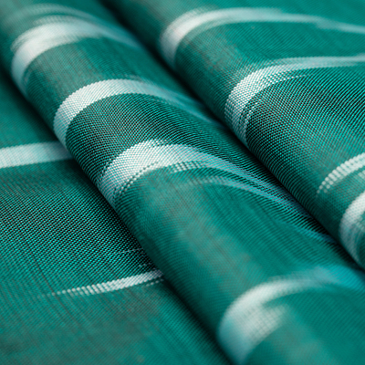Pañuelo ikat de seda - Bufanda Ikat de seda con flecos tejida a mano en verde azulado de Uzbekistán