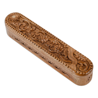 Wood puzzle box, 'Oblong Paradise' - Hand-Carved Oblong Floral Walnut Wood Puzzle Box