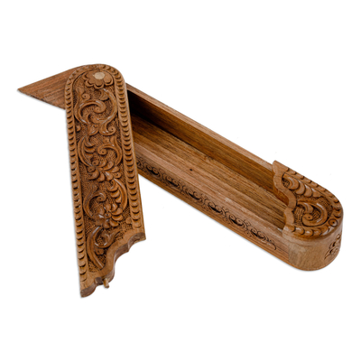Wood puzzle box, 'Oblong Paradise' - Hand-Carved Oblong Floral Walnut Wood Puzzle Box