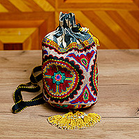 Embroidered silk drawstring sling, 'Spring Spirit' - Iroqi Embroidered Floral Silk Drawstring Sling with Tassels