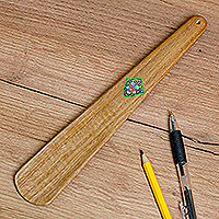 Wood shoehorn, 'Magnificent Pace' - Hand-Carved Walnut Wood Shoehorn with Green Floral Detail
